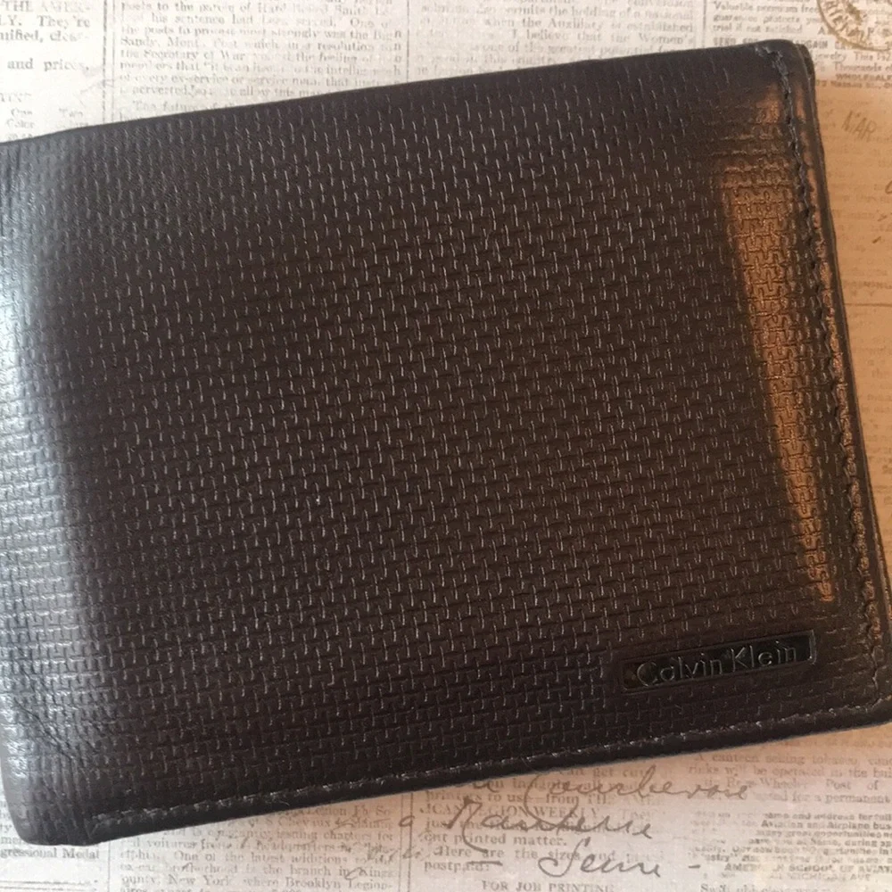 Calvin Klein Textured Leather Bi-Fold Wallet